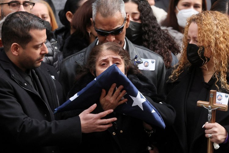Emotional tributes recall NYPD officer’s dedication, love of life, family
